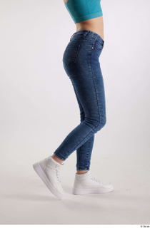 Rada  1 blue jeans casual dressed flexing leg side…